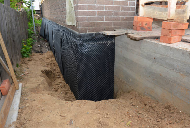 Happy homeowners after waterproofing job in Williston